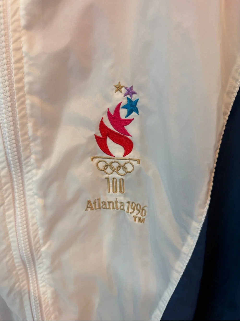 Vintage STARTER Atlanta 1996 Olympic Games White, Red & Navy Men’s windbreaker.
